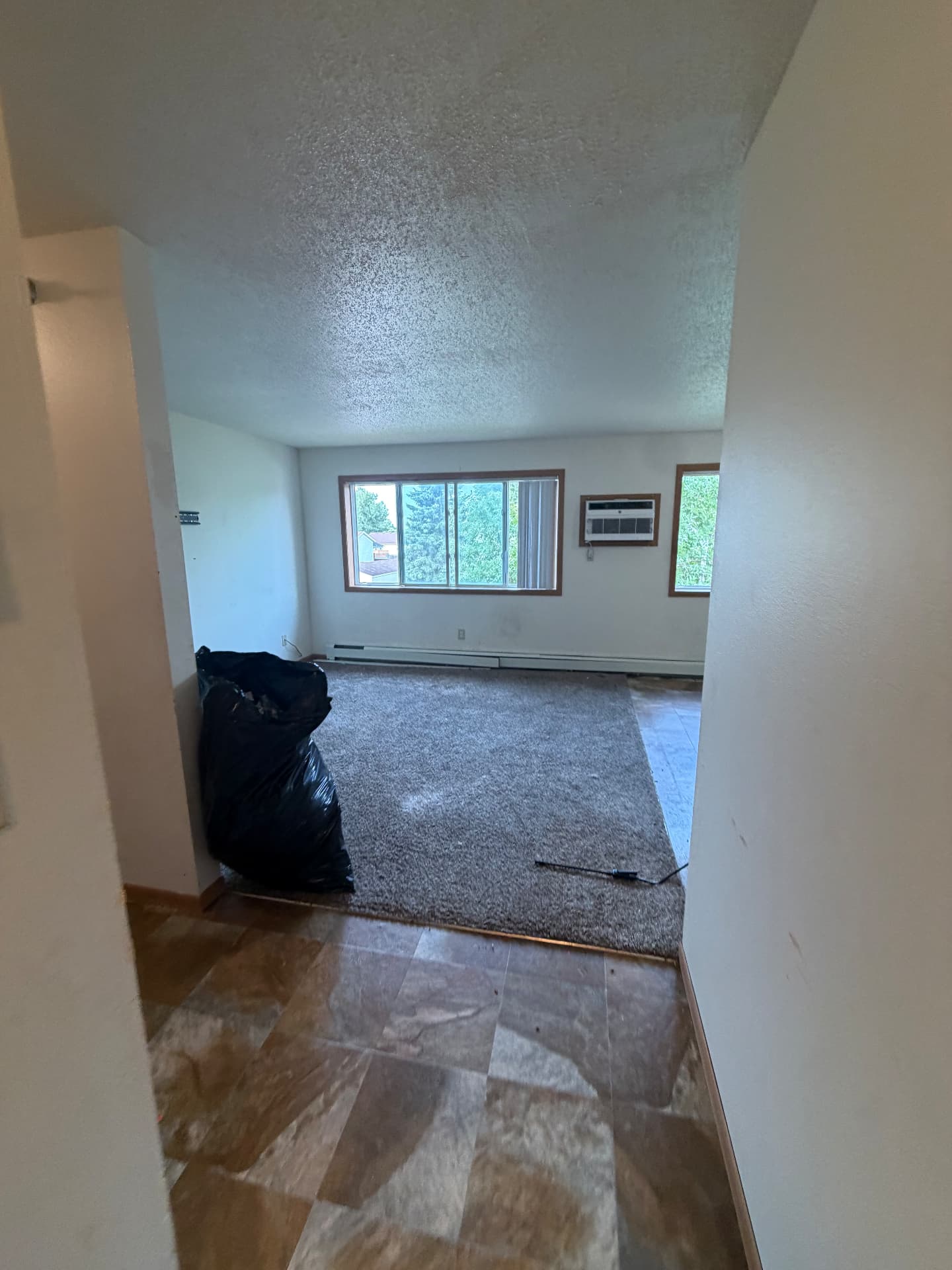 After: the same room cleared and cleaned by 701 Haulers