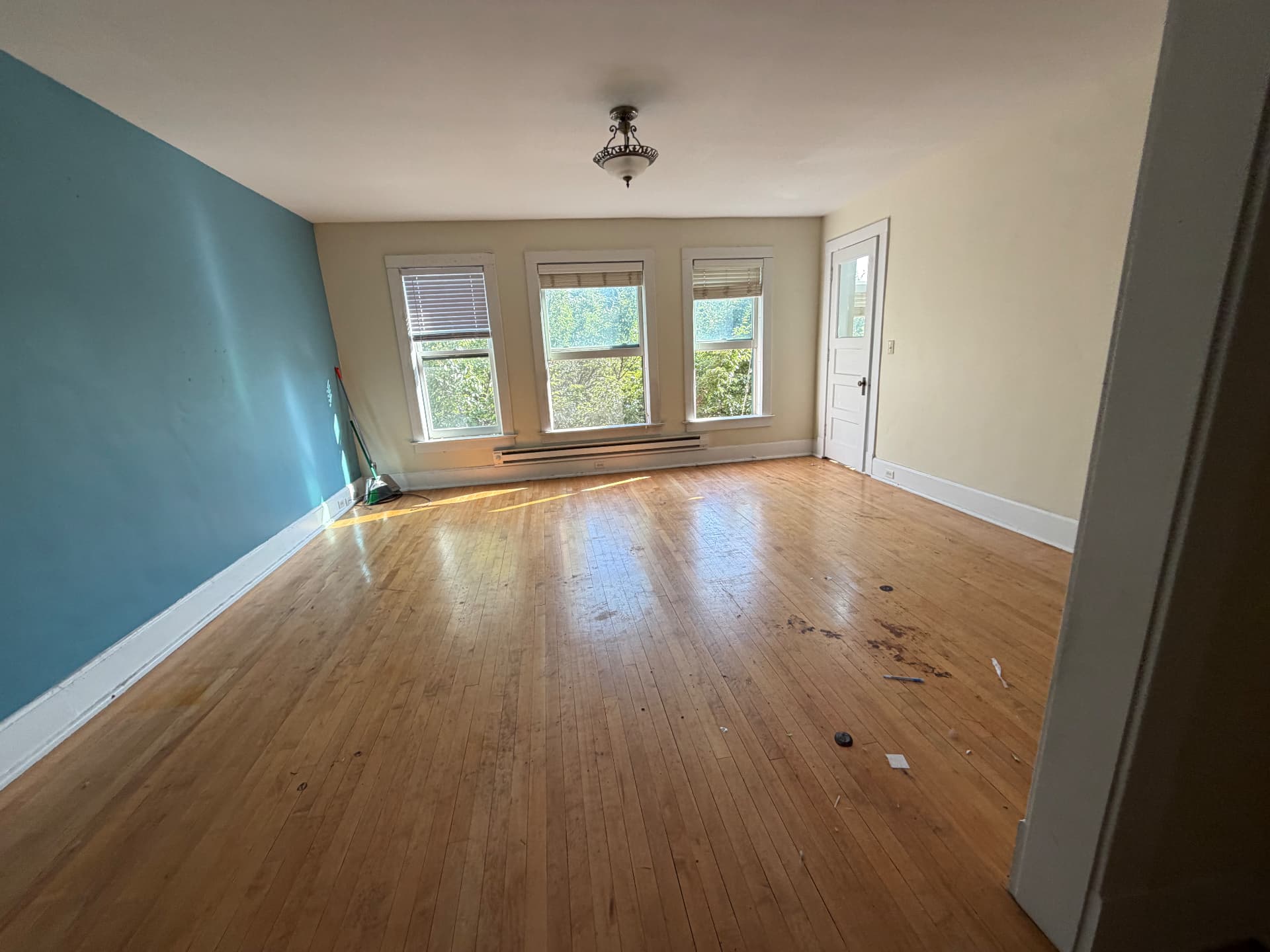 After: the same living room cleared and cleaned by 701 Haulers, ready for its next purpose